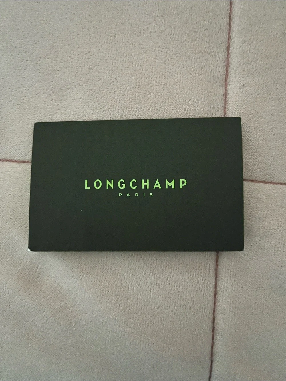 Longchamp Black Box with Neon Green Logo